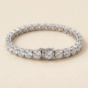 Round moissanite tennis bracelet in a four-prong white gold setting with a box clasp