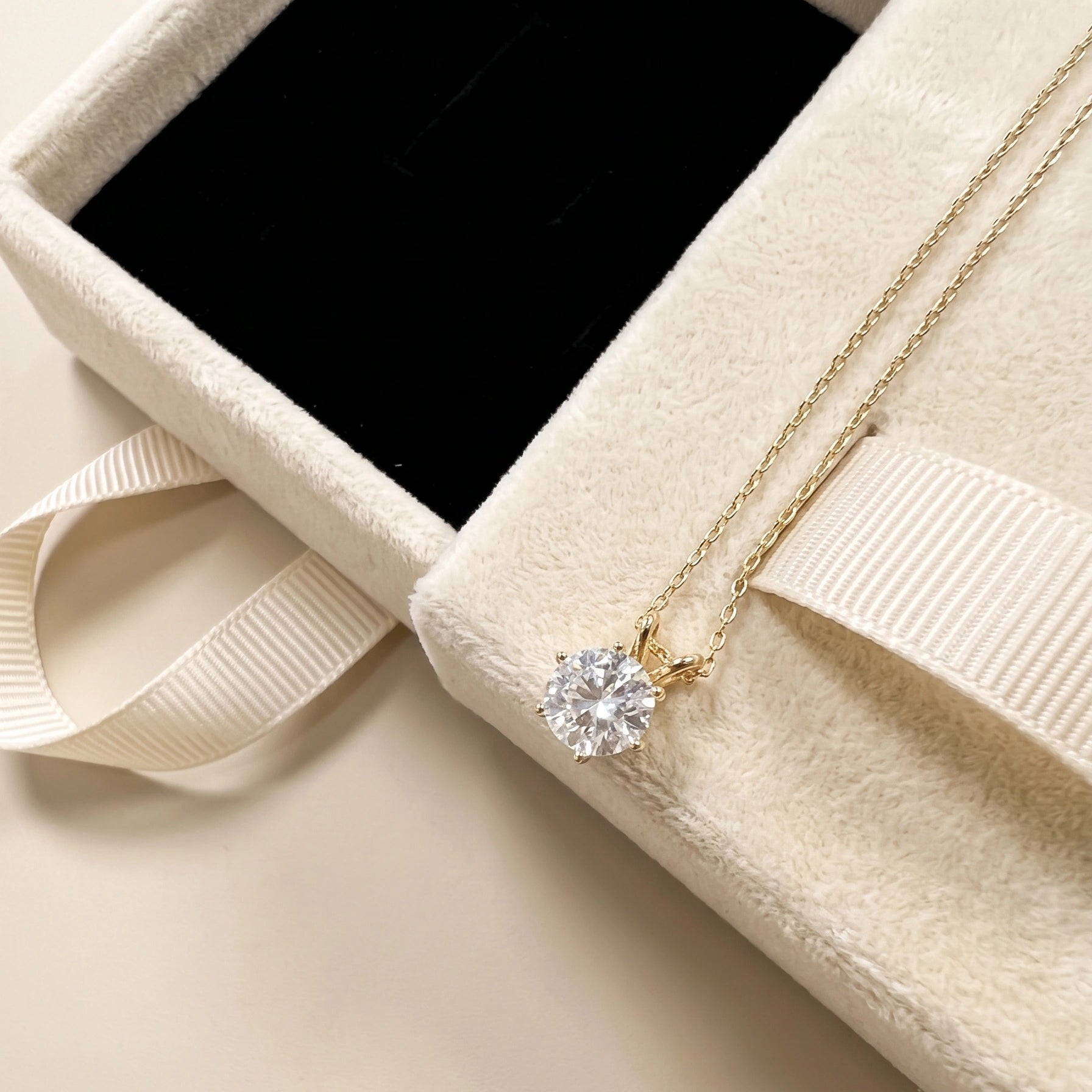 14K gold filled moissanite solitaire necklace with round D color VVS1 stone in six-prong crown setting on adjustable gold chain, tarnish resistant and safe for sensitive skin - Sensitive Stones