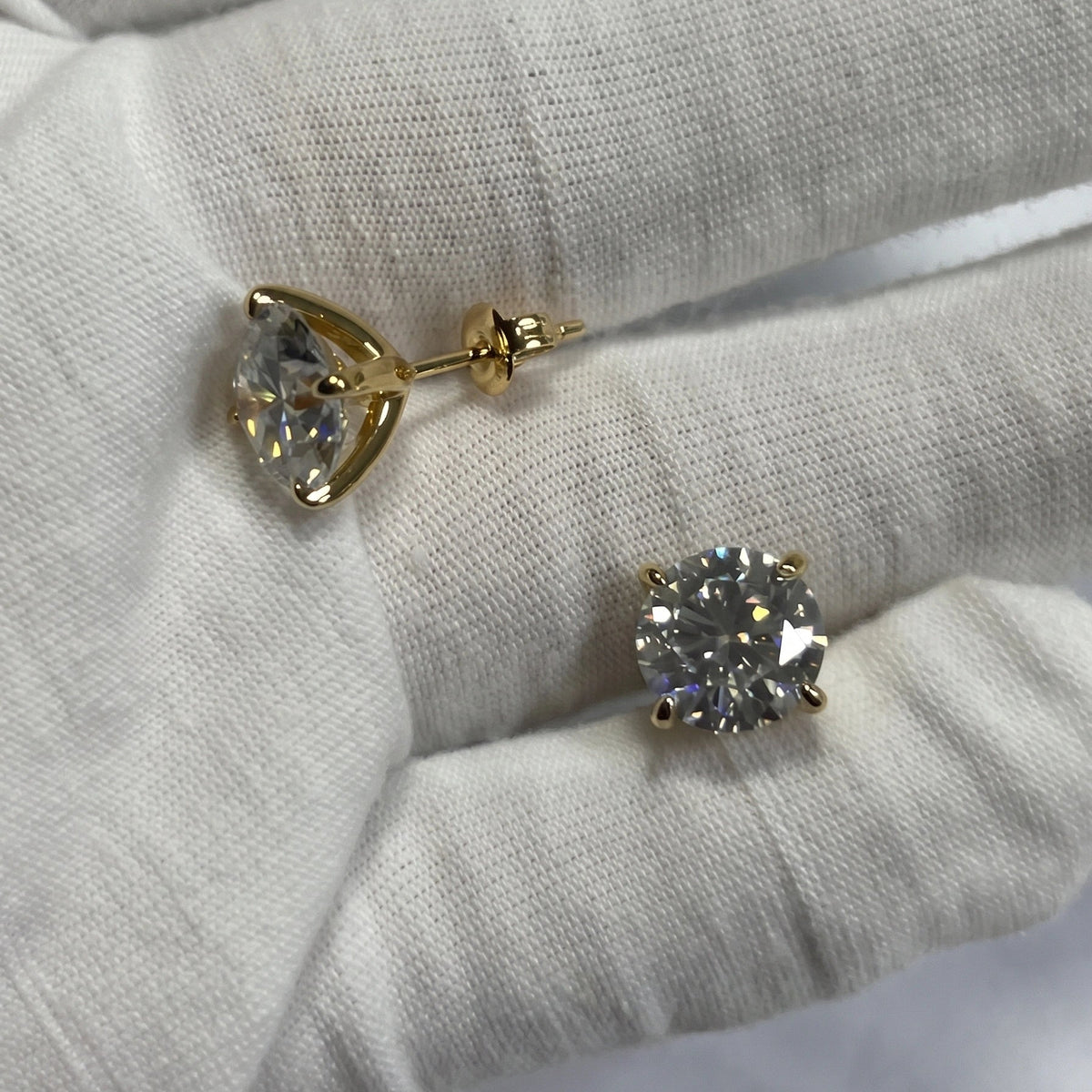 14K gold filled moissanite solitaire stud earrings in yellow gold, actual product photo showing push-back closure and stone brilliance - Sensitive Stones