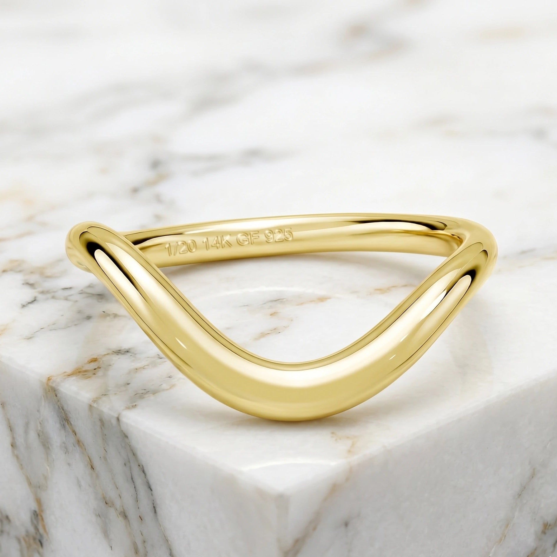 14K gold filled wishbone wave stacking ring on marble block showing curved band silhouette - Sensitive Stones