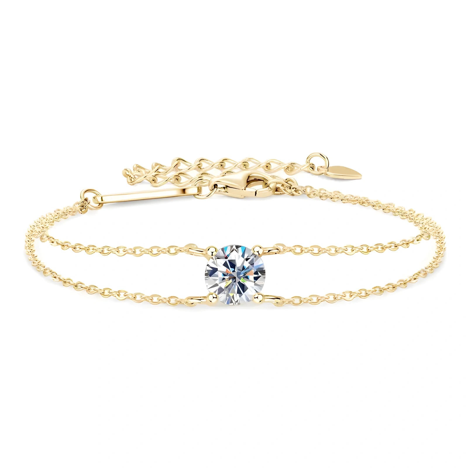 A delicate yellow gold chain bracelet featuring a central round-cut clear moissanite in a prong setting, with an adjustable lobster clasp and extension chain on a plain white background - Sensitive Stones