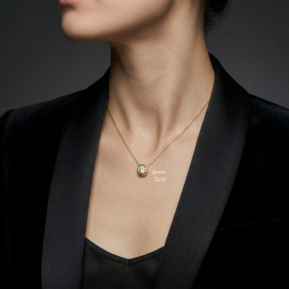 Woman wearing 2ct bezel moissanite pendant necklace in 18K gold plating on delicate O-chain - Sensitive Stones