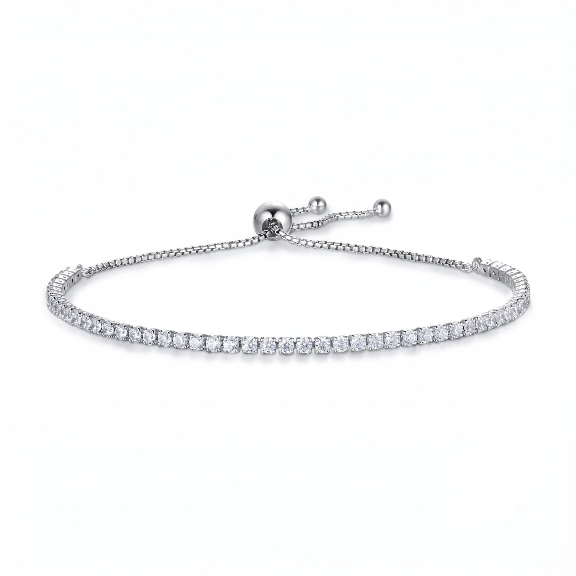 A white gold 2mm moissanite bolo tennis bracelet in 925 sterling silver on a white background, full edge-to-edge round stone setting - Sensitive Stones