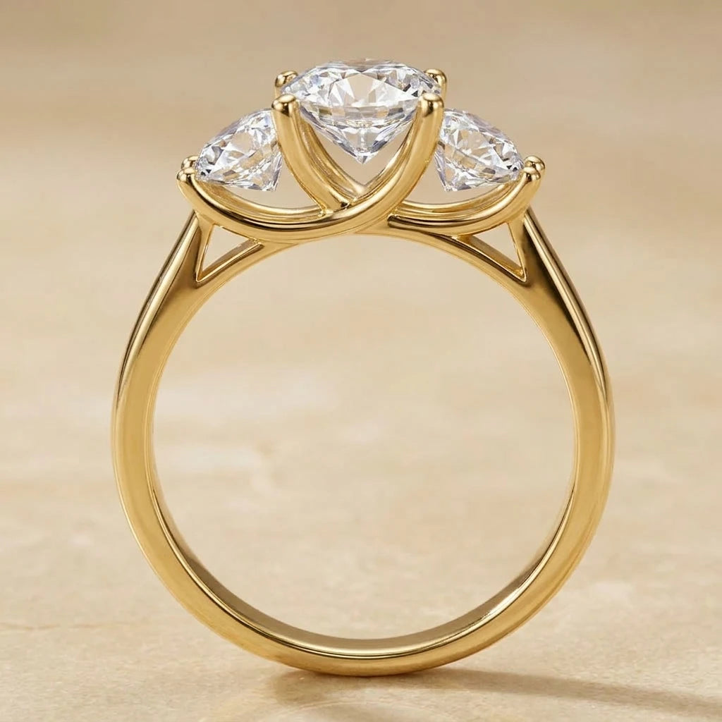 Side profile of the 3 stone moissanite engagement ring in 14K gold filled showing the setting height - Sensitive Stones