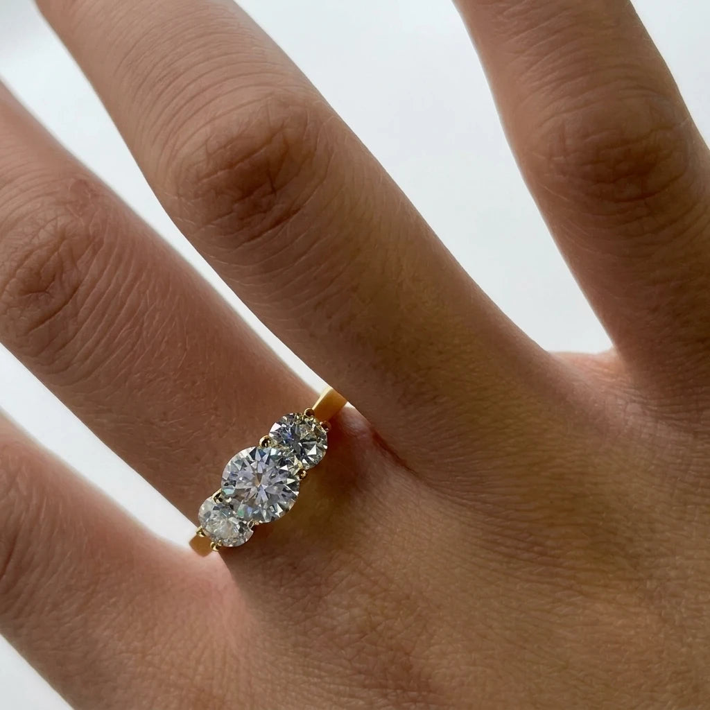 2ct three stone moissanite engagement ring in 14K gold filled worn on the hand - Sensitive Stones