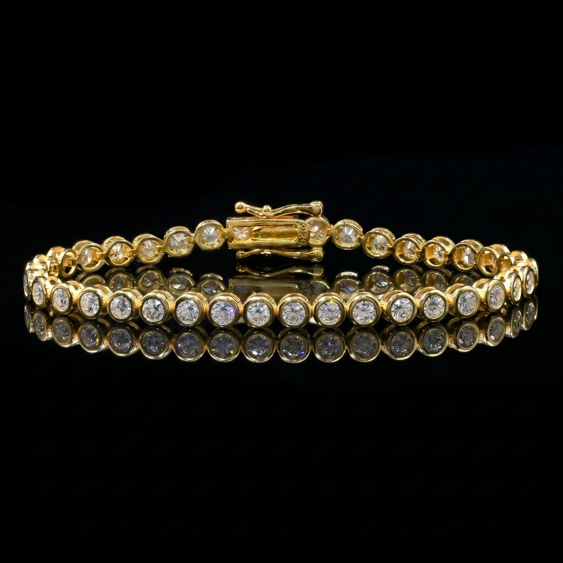 3mm bezel moissanite tennis bracelet with D color VVS1 stones in 925 sterling silver and 18k yellow gold finish, illuminated against a black background to show fire and brilliance - Sensitive Stones