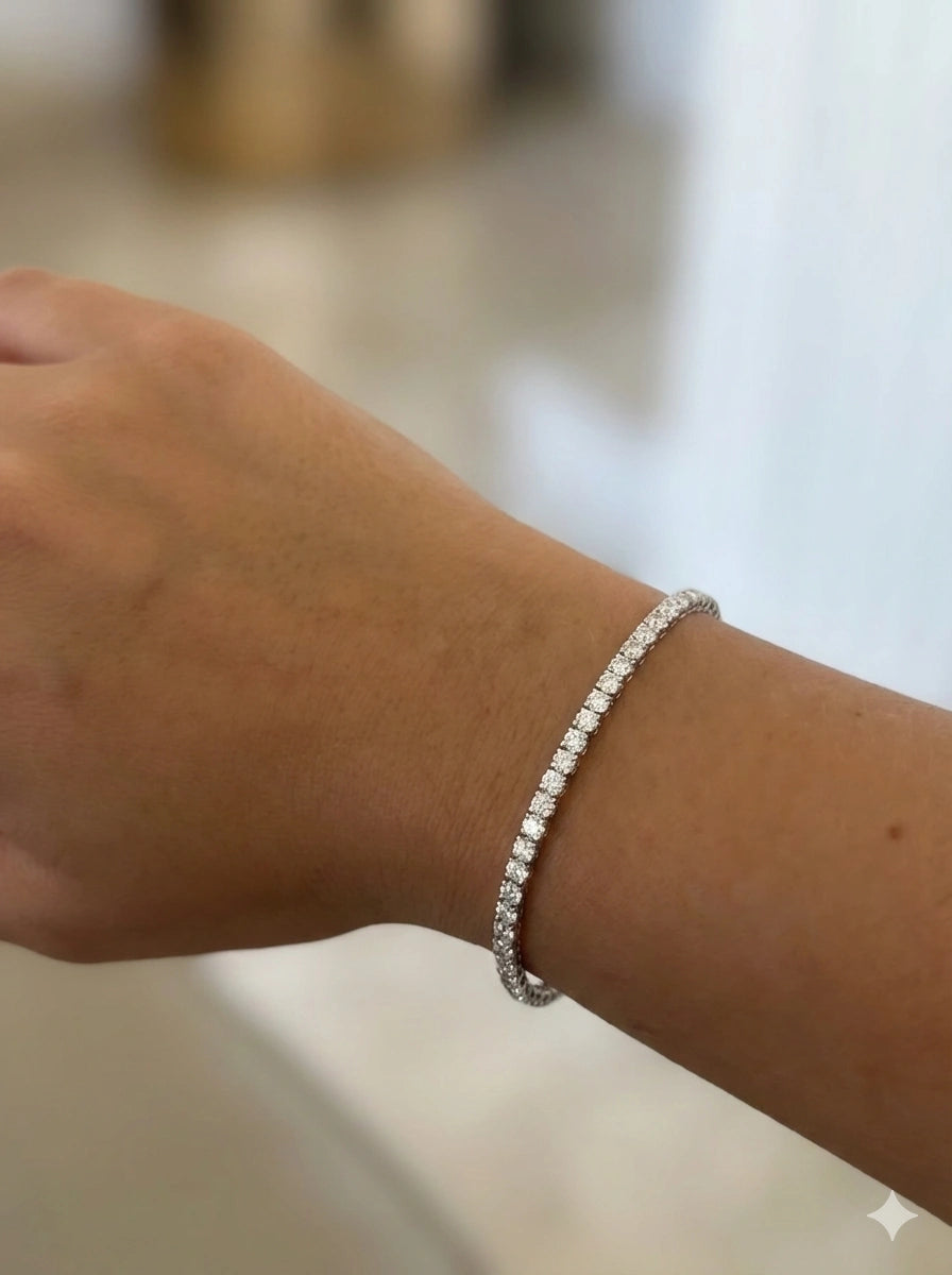 Hand wearing 3mm elastic stretch rope moissanite tennis bracelet set in 925 silver with white gold plating - Sensitive Stones