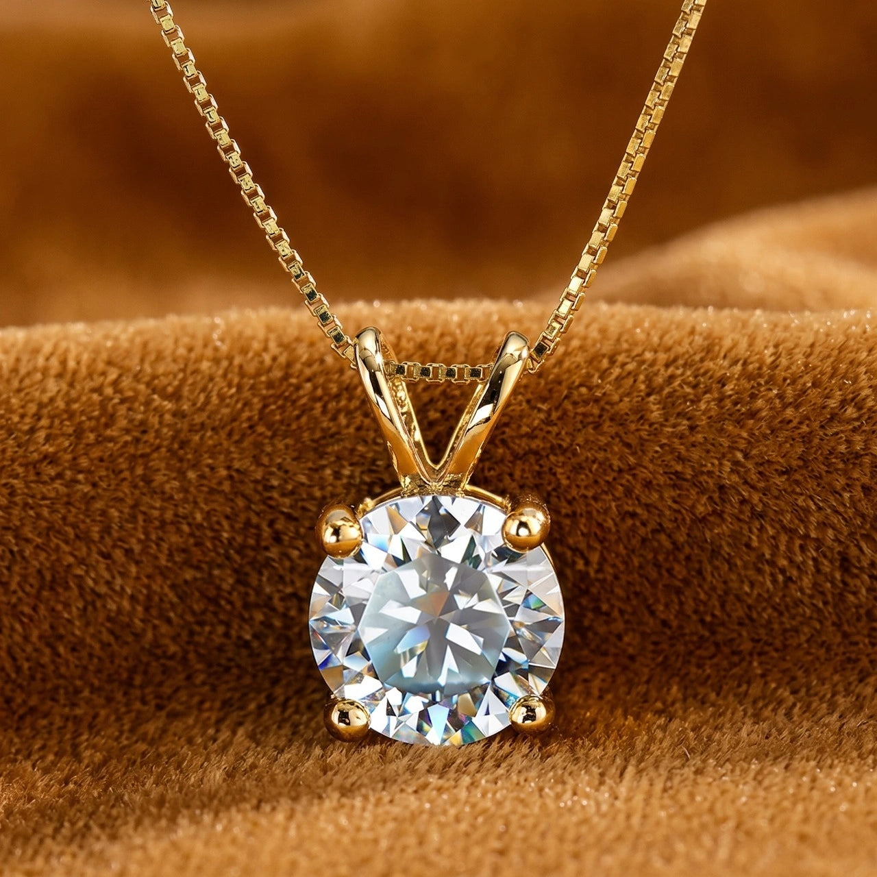 Close up of 4-prong moissanite solitaire necklace in 925 sterling silver in 18k gold plating - Sensitive Stones