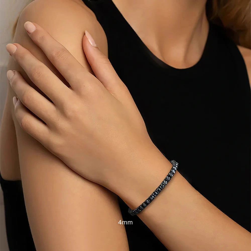 4mm Black moissanite tennis bracelet worn with black sleeveless dress - Sensitive Stones