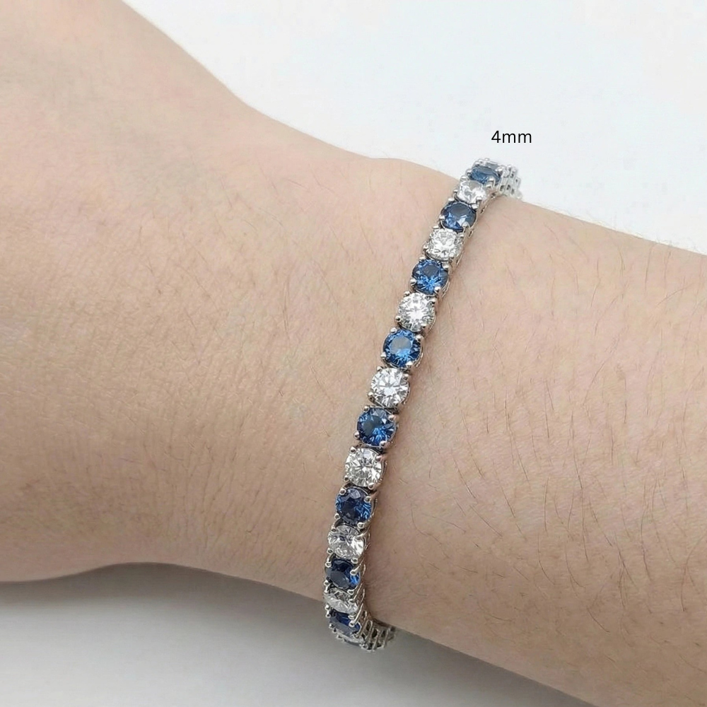 Alternating blue and white 4mm moissanite tennis bracelet 925 sterling silver worn on wrist - Sensitive Stonesmm