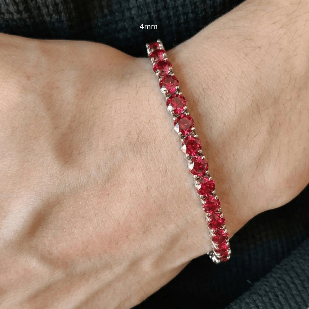 Lab-created 4mm red moissanite tennis bracelet featuring round-cut stones with 8 Hearts & 8 Arrows precision cut in classic 4-prong setting worn o a man's wrist- Sensitive Stones