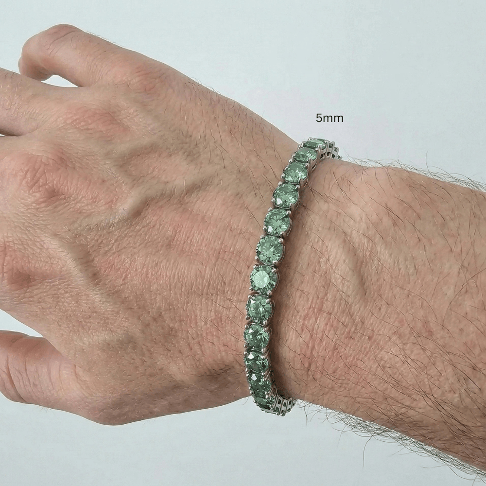 5mm green moissanite tennis bracelet worn on wrist in 925 sterling silver with white gold plating on a man's wrist - Sensitive Stones