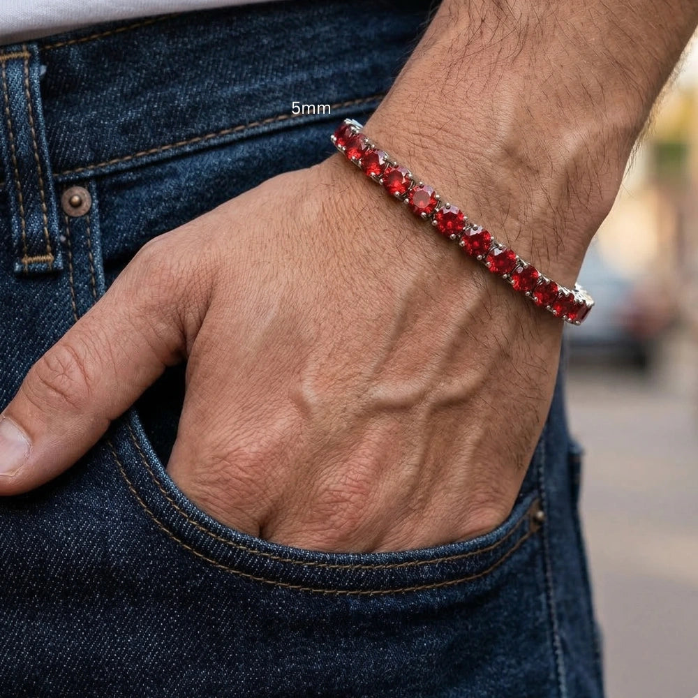 Hand wearing a 5mm red moissanite tennis bracelet in 925 silver paired with denim jeans - Sensitive Stones