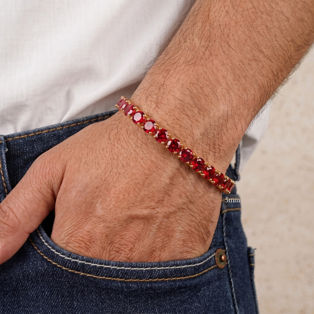 5mm red moissanite tennis bracelet in yellow gold plated sterling silver worn on a man's wrist with denim jeans - Sensitive Stones