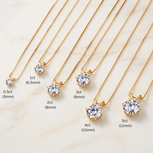 6-prong moissanite solitaire necklace stone size comparison from 0.5ct (5mm) to 5ct (11mm) in yellow gold - Sensitive Stones