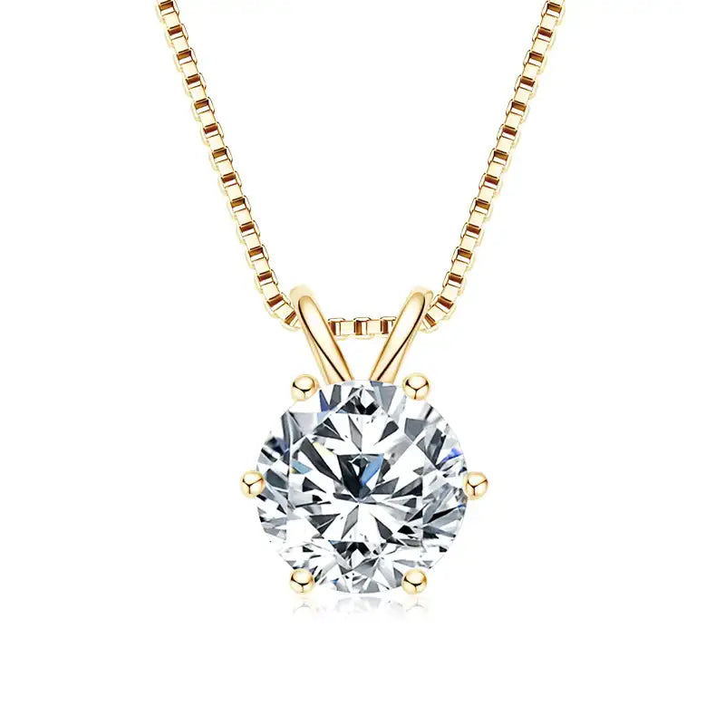 6-prong moissanite solitaire necklace in 925 sterling silver with a yellow gold finish on a white background - Sensitive Stones
