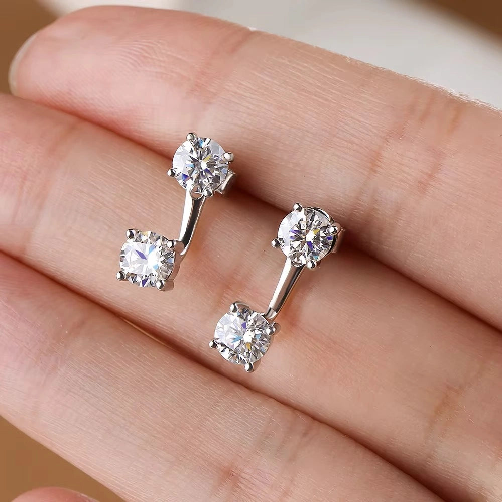 Moissanite double stud jacket earrings in 925 sterling silver shown on hand displaying detachable two-in-one design - Sensitive Stones