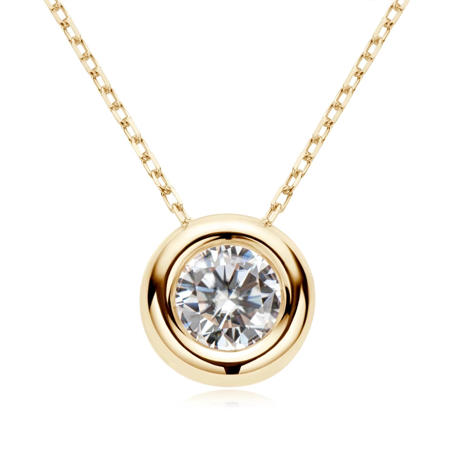 Bezel set moissanite pendant necklace in 18K gold plating on white background - Sensitive Stones
