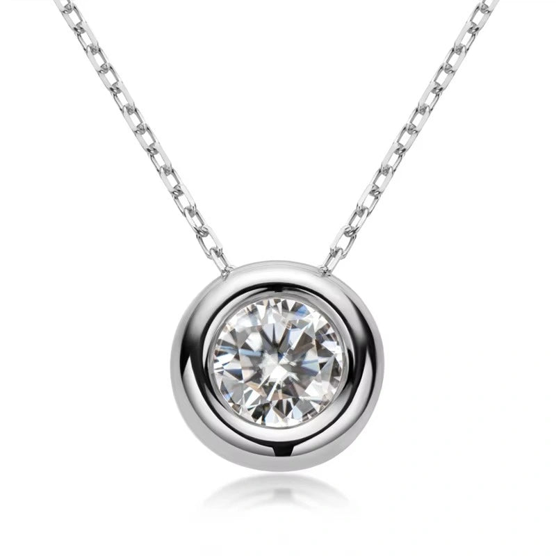 Bezel set moissanite pendant necklace in 925 sterling silver on white background - Sensitive Stones