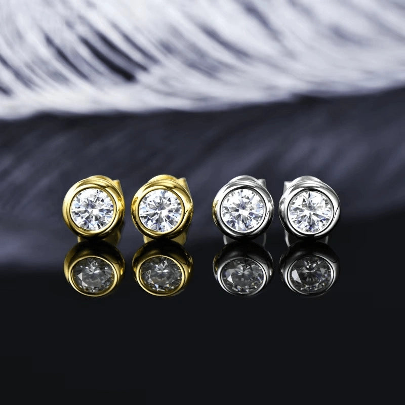 Bezel moissanite stud earrings in 18K gold and 925 sterling silver side by side comparison - Sensitive Stones