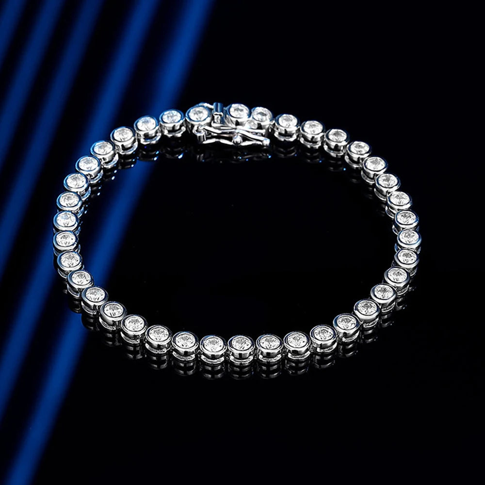 3mm bezel moissanite tennis bracelet with D color VVS1 stones in 925 sterling silver, illuminated against a black background to show fire and brilliance - Sensitive Stones