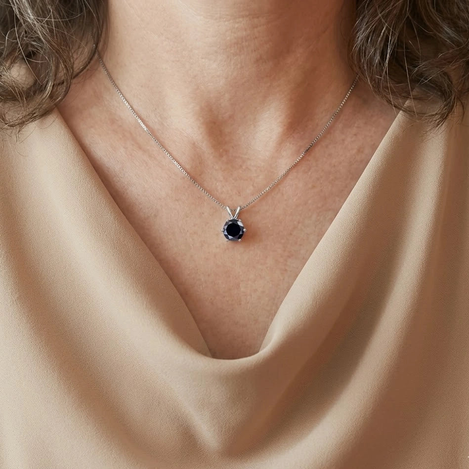 Black moissanite solitaire necklace with a pendant worn by a woman - Sensitive Stones