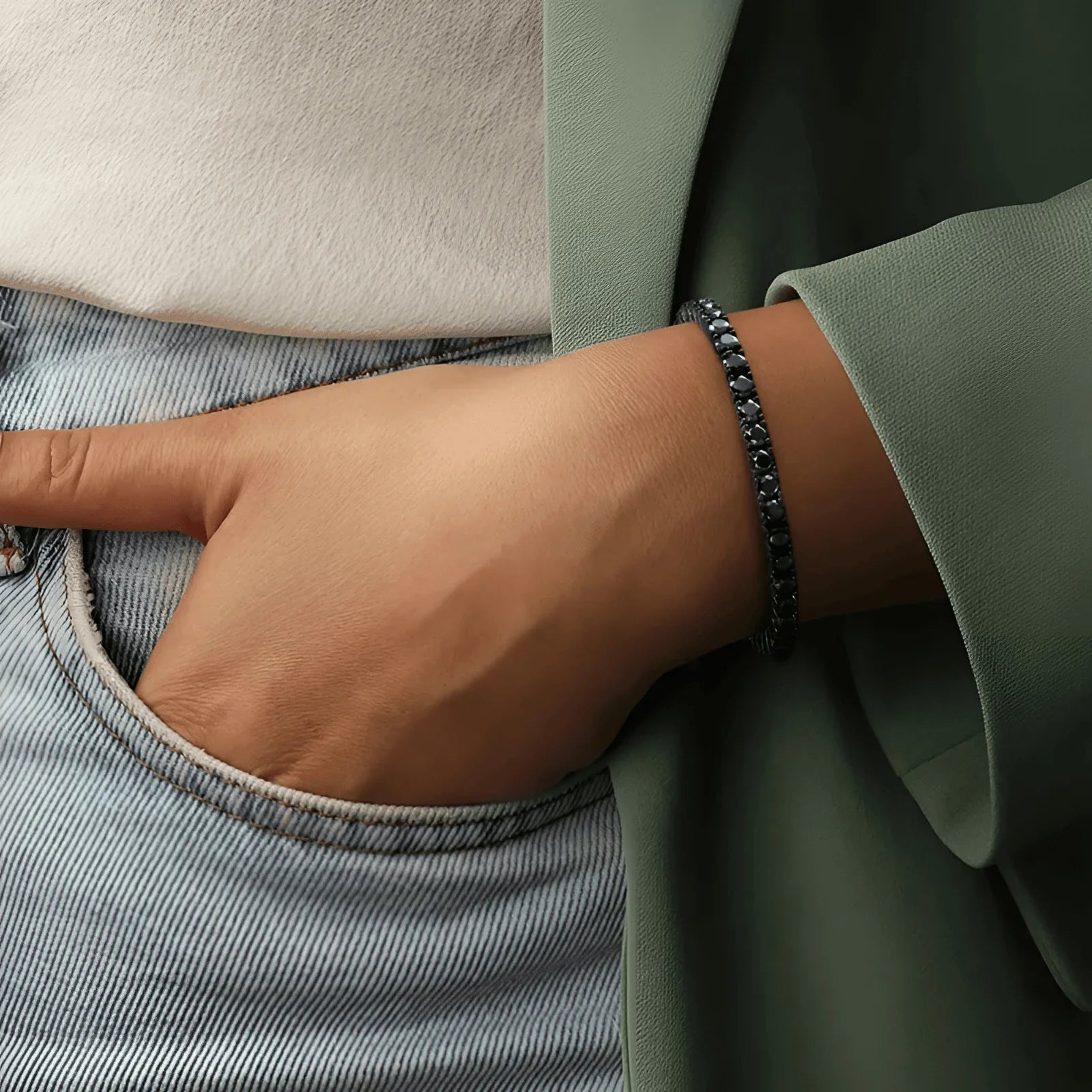 Black moissanite tennis bracelet worn with jeans and blazer | Sensitive Stones