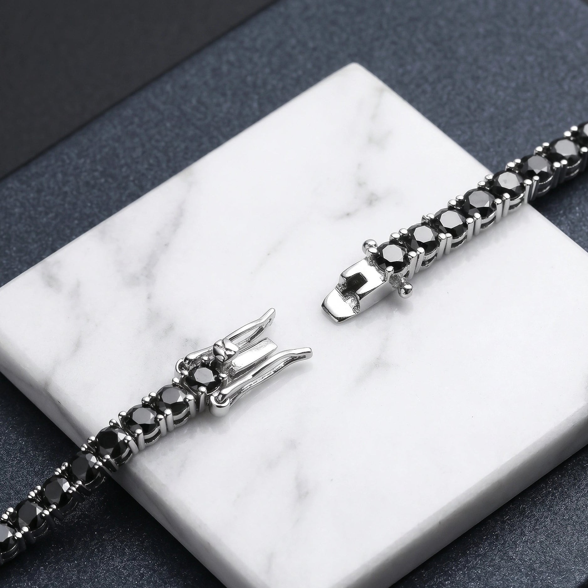 Clasp detail of black moissanite tennis bracelet in black gold over silver - Sensitive Stones