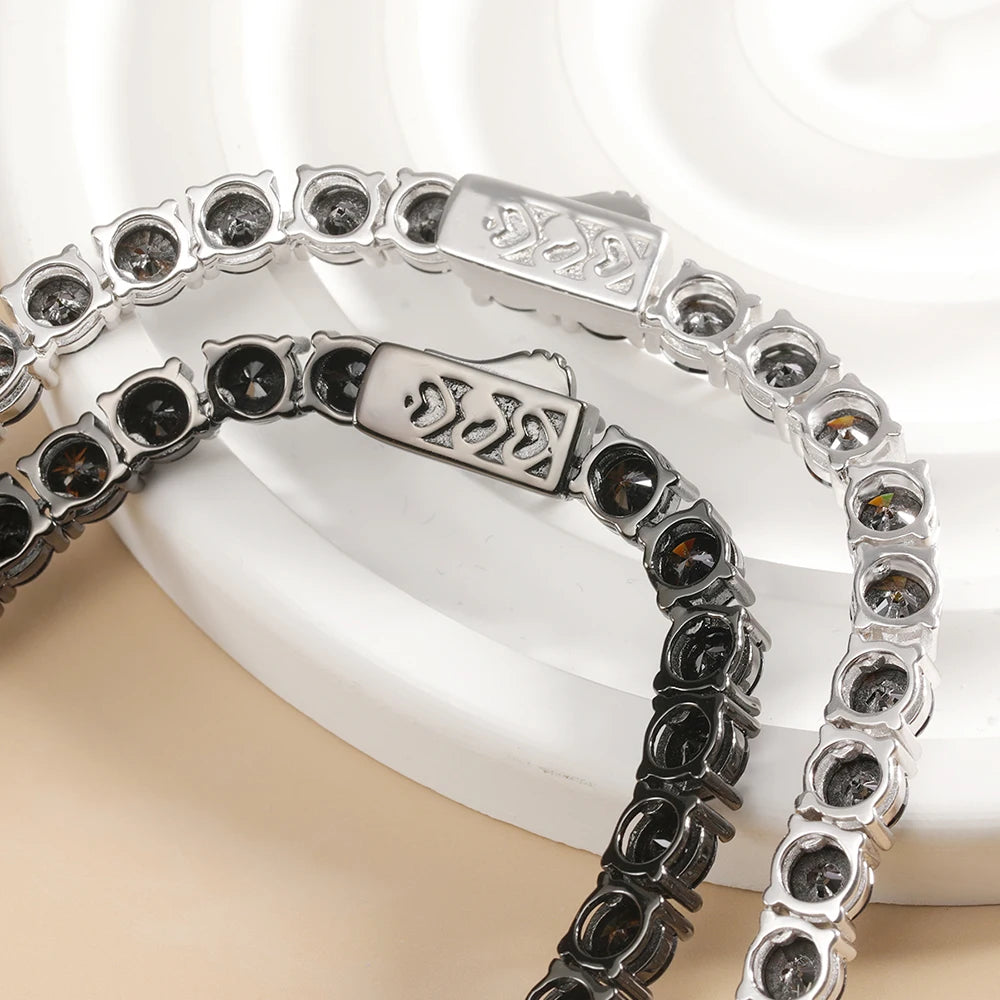 Close-up of secure box clasp on black moissanite tennis necklace with 18k gold plating - Sensitive Stones