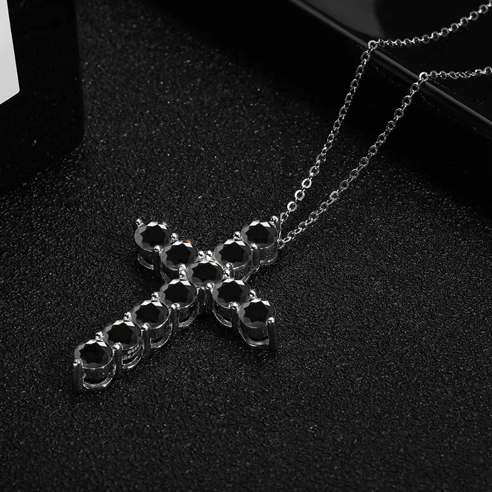 Black moissanite cross pendant necklace in 925 silver on a black background - Sensitive Stones