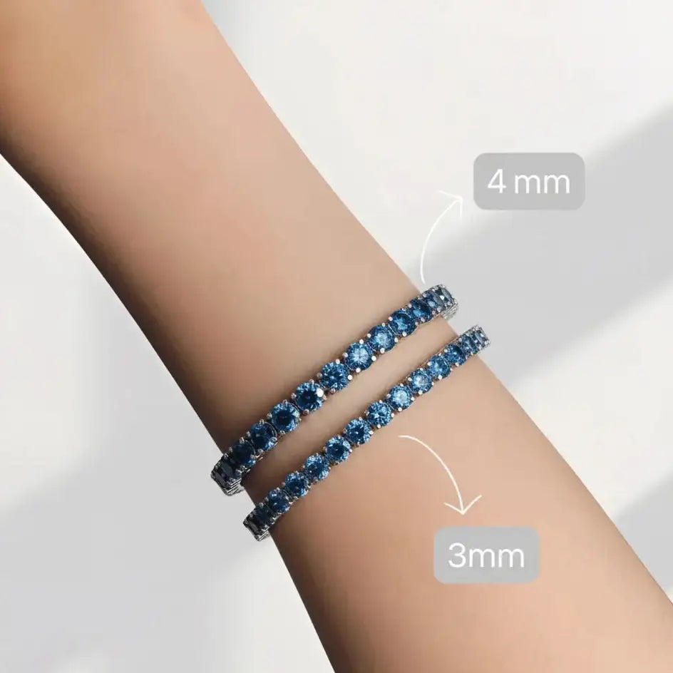 Blue and white moissanite tennis bracelets in sterling silver shown in 3mm and 4mm sizes on wrist, demonstrating width difference and quiet luxury craftsmanship - Sensitive Stones
