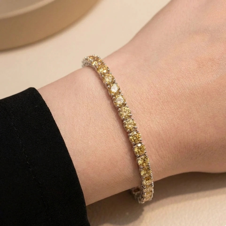 Champagne moissanite tennis bracelet lifestyle photo showing fit and sparkle on wrist - Sensitive Stones