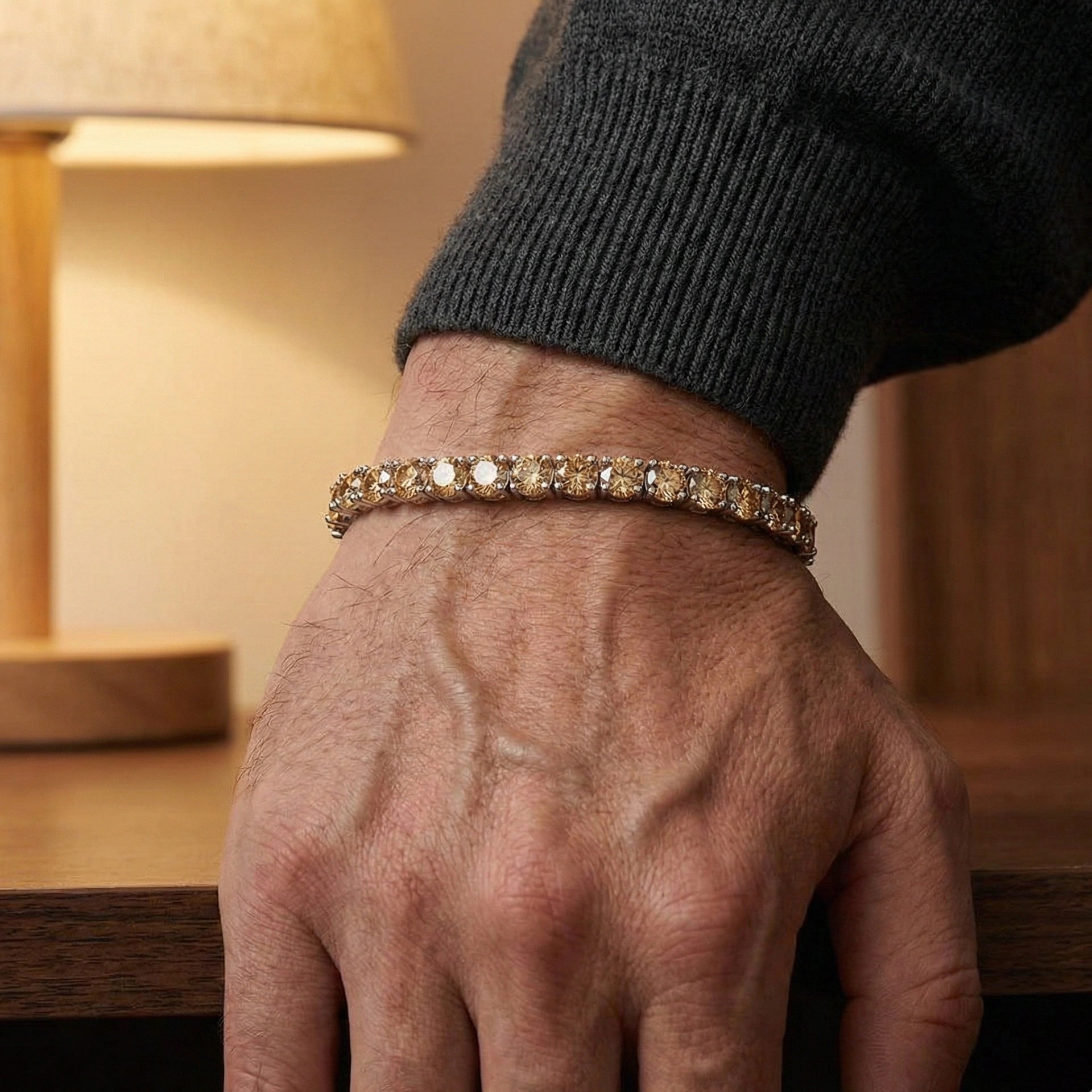 4mm champagne yellow moissanite tennis bracelet on wrist in warm natural light, 925 sterling silver with 4-prong setting - Sensitive Stones