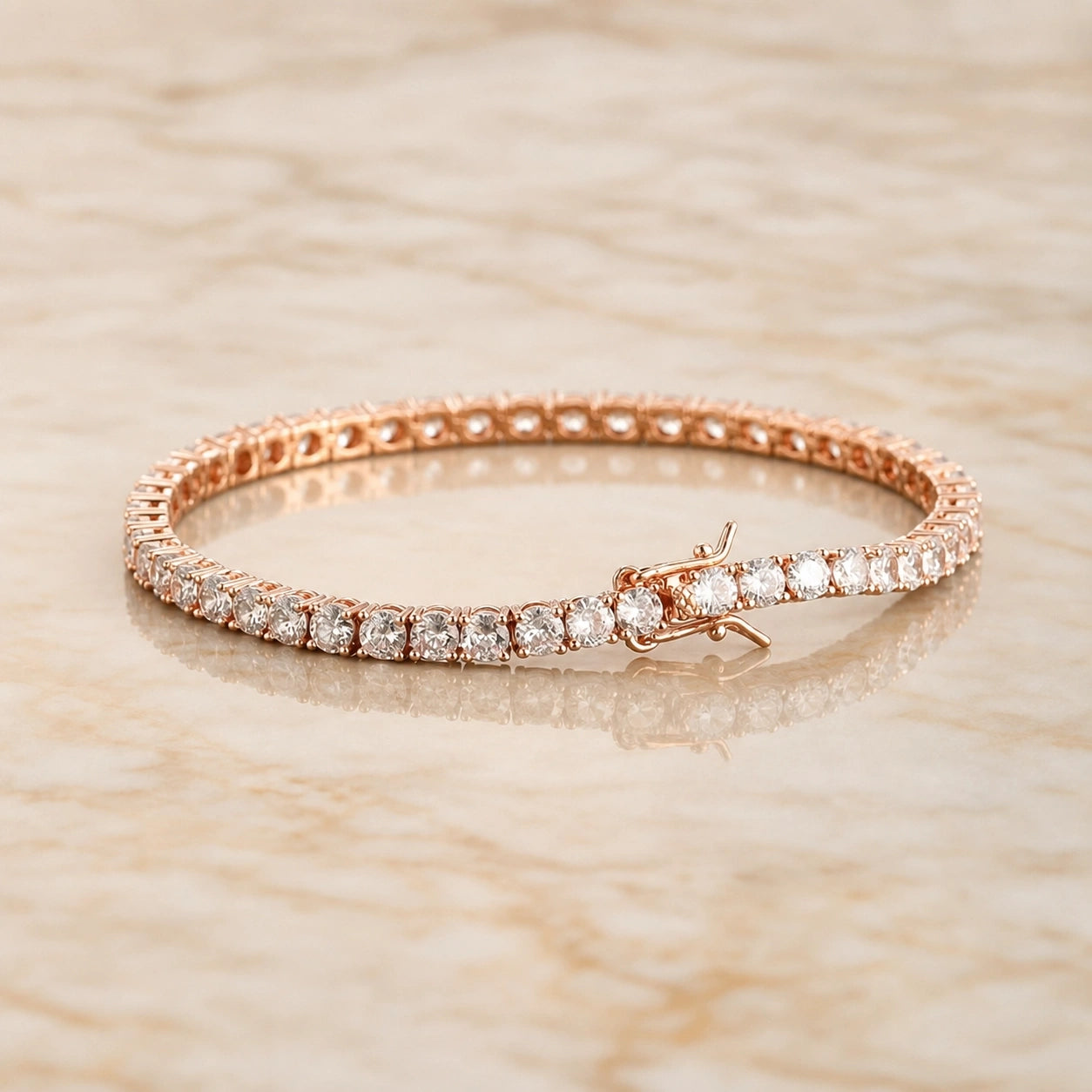 Rose gold moissanite tennis bracelet with a continuous row of round brilliant clear stones on a marble surface - Sensitive Stones