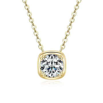 Cushion bezel set moissanite pendant necklace in yellow gold finish on a cable chain against a plain background - Sensitive Stones