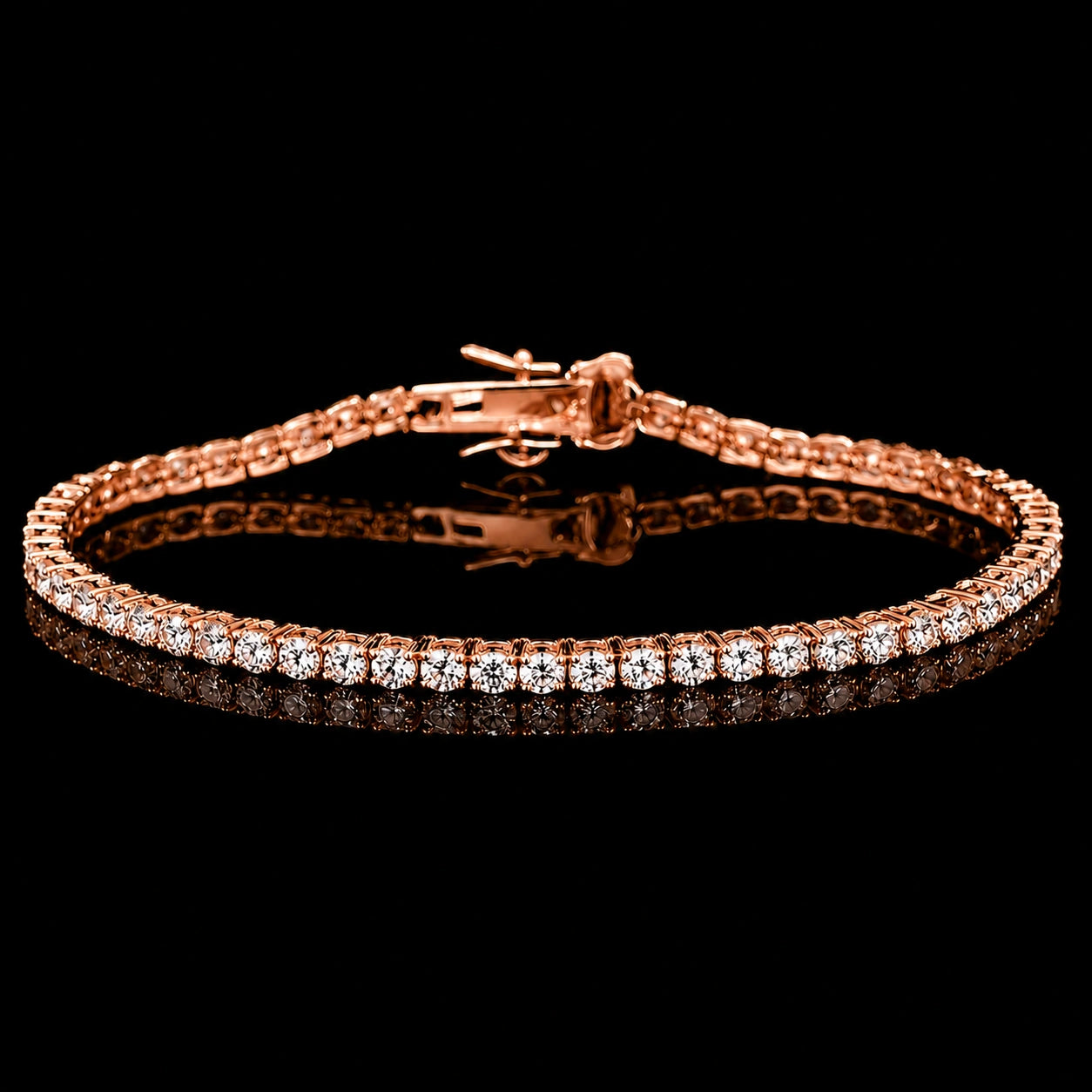 A 2mm dainty moissanite tennis bracelet with clear round-cut stones set in 925 sterling silver with rose gold finish, featuring a central clasp, displayed on a reflective black surface against a black background - Sensitive Stones