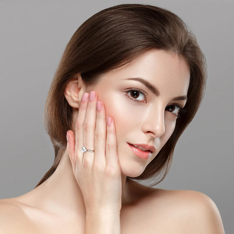 Timeless moissanite solitaire engagement ring lifestyle photo - Sensitive Stones