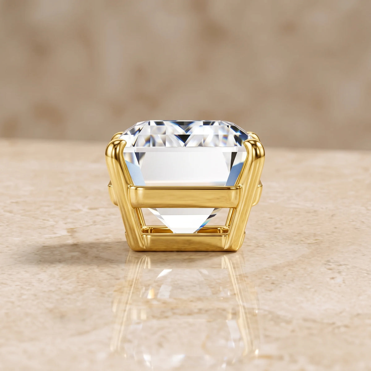 Close-up of the four-prong open basket setting holding the emerald cut moissanite in 14K gold filled - Sensitive Stones