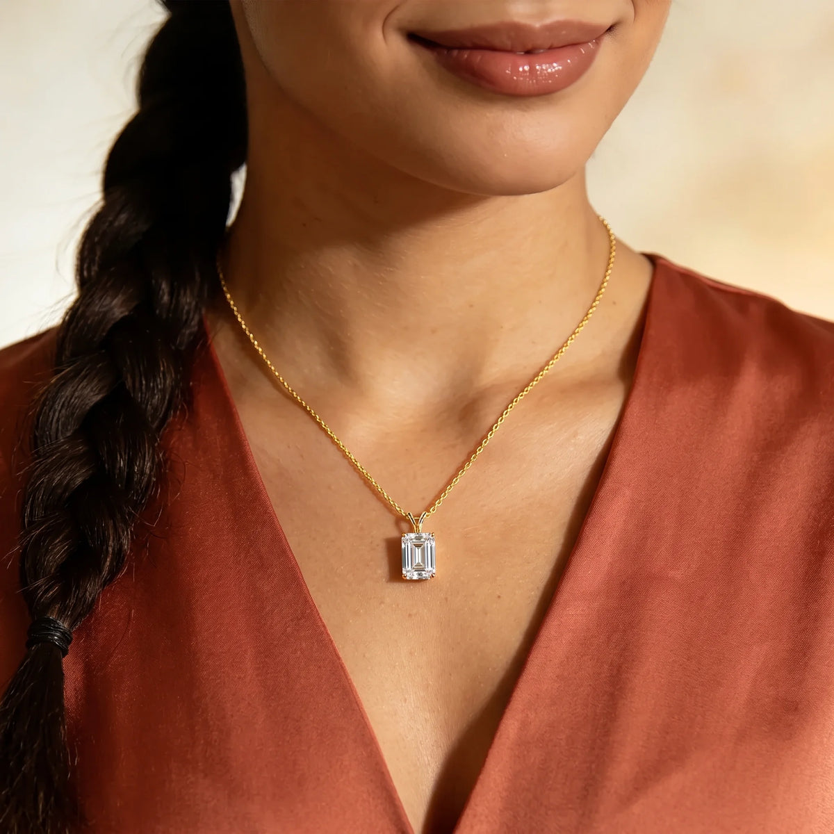 10x8mm 4ct emerald cut moissanite pendant necklace in 14K gold filled worn at the collarbone - Sensitive Stones