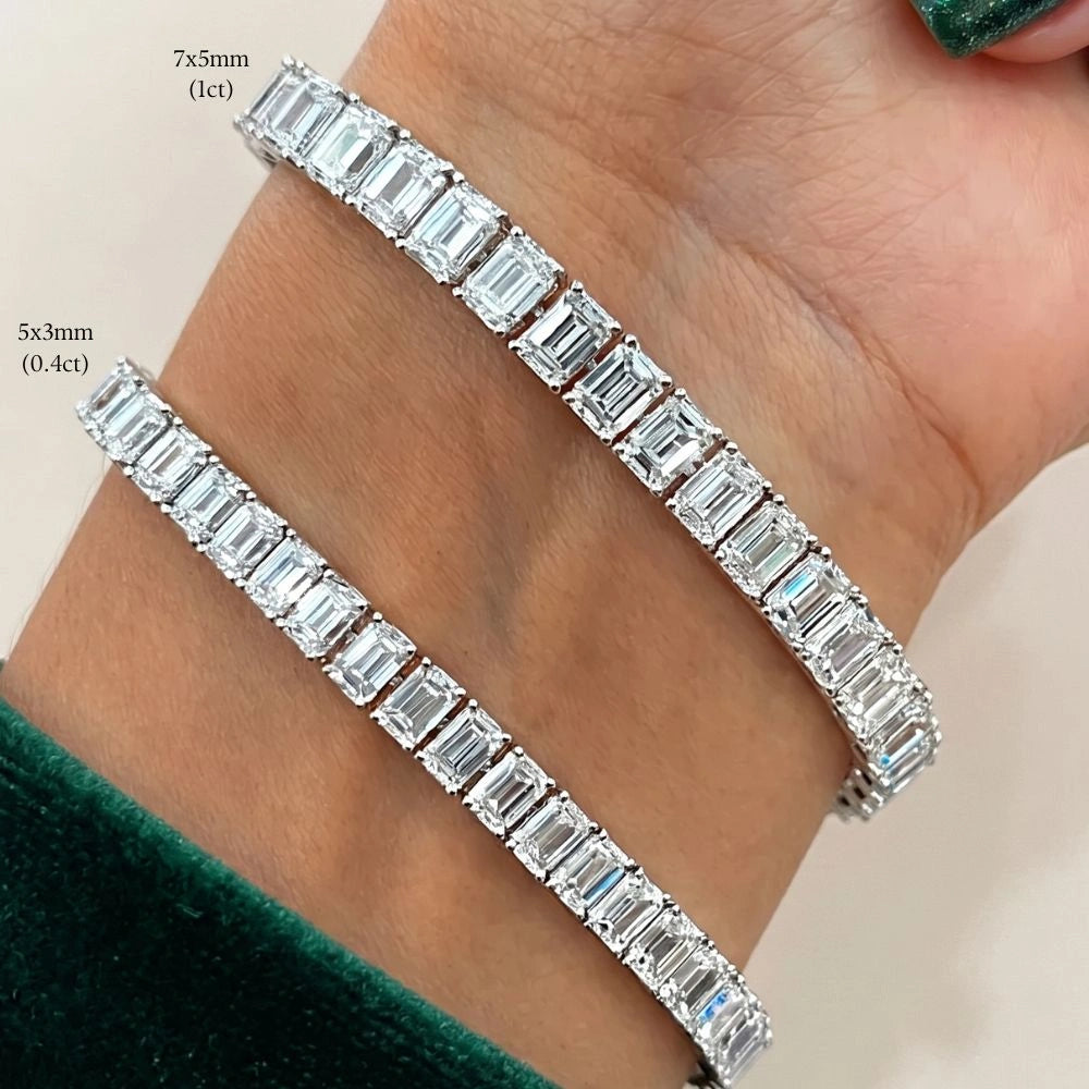Emerald cut moissanite tennis bracelet size comparison showing 5x3mm 0.4ct next to 7x5mm 1ct stones in 925 sterling silver - Sensitive Stones