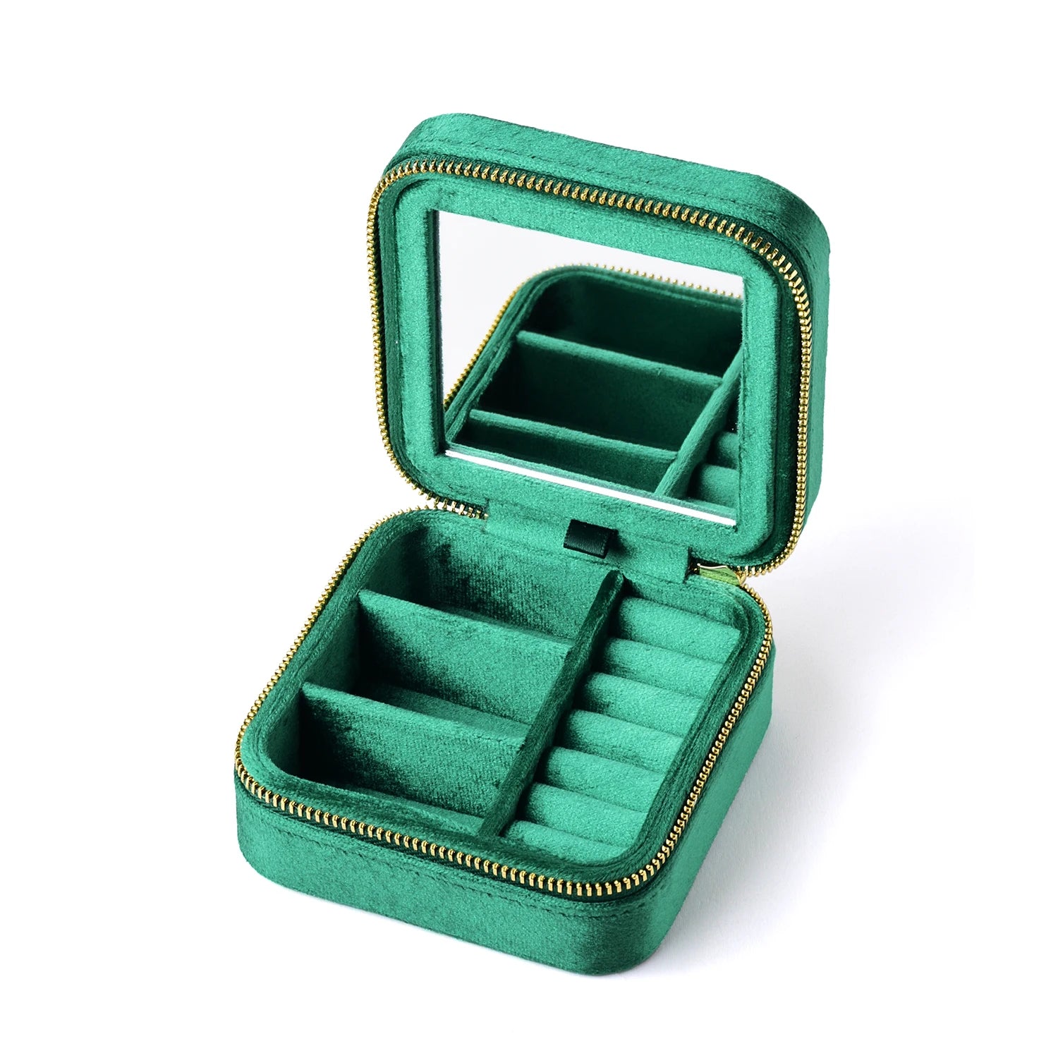 Emerald green velvet travel jewelry box open showing ring rolls and earring compartments with built-in mirror - Sensitive Stones