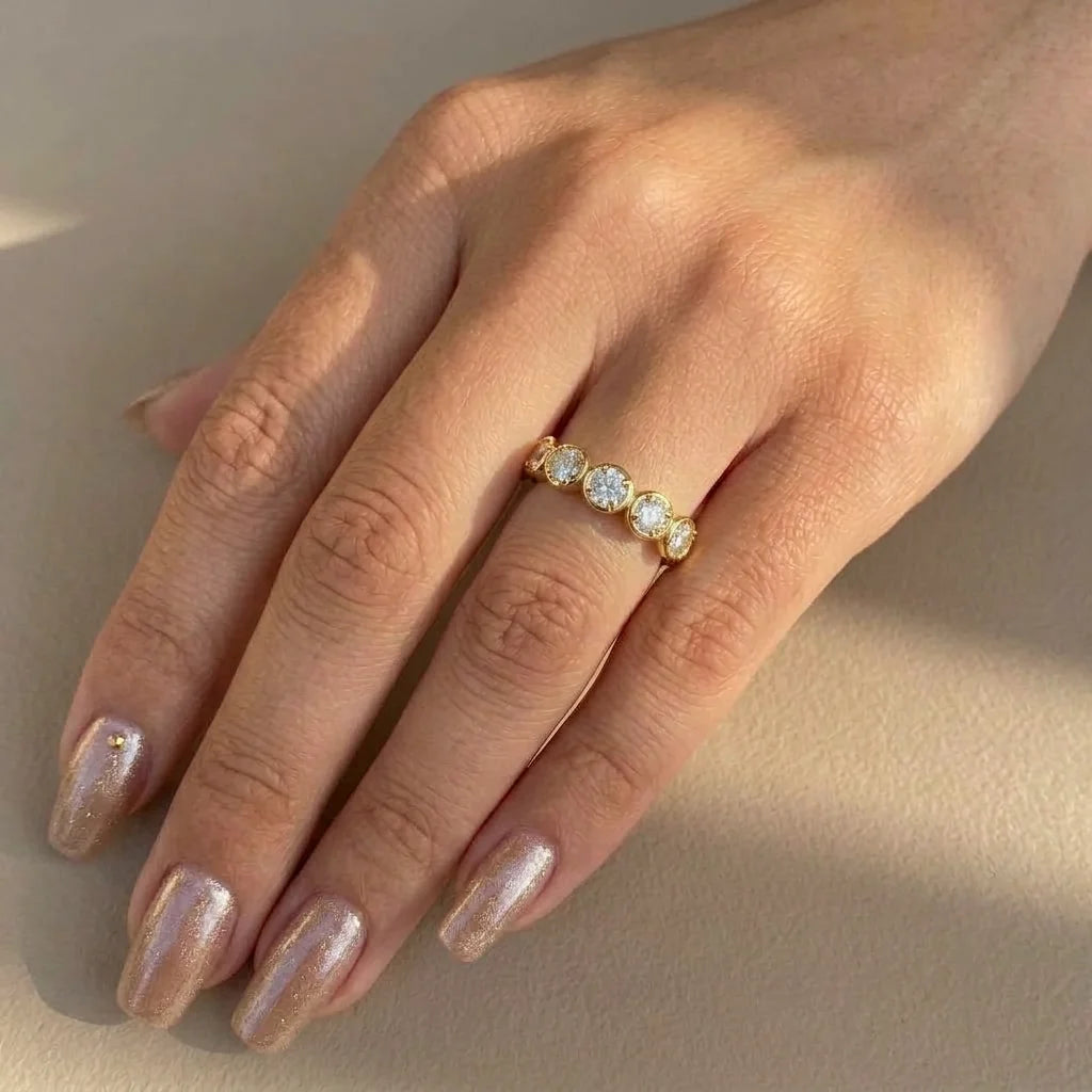 Five stone bezel moissanite ring in 14K gold filled worn on the hand, everyday stacking band - Sensitive Stones