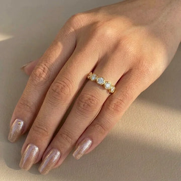 Five stone bezel moissanite ring in 14K gold filled worn on the hand, everyday stacking band - Sensitive Stones