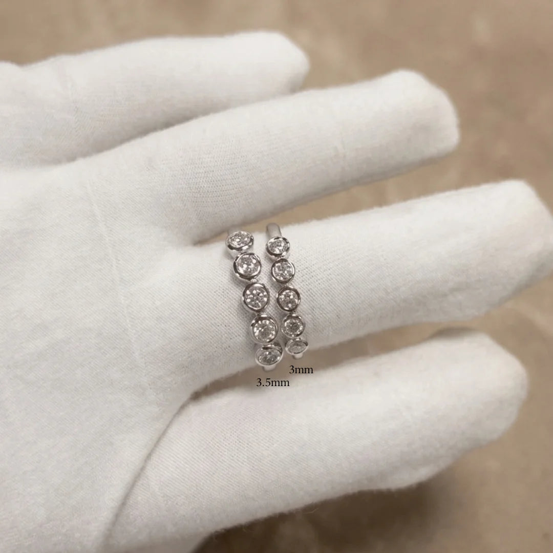 Five stone bezel moissanite ring size comparison, 3mm and 3.5mm stones worn side by side on the hand - Sensitive Stones