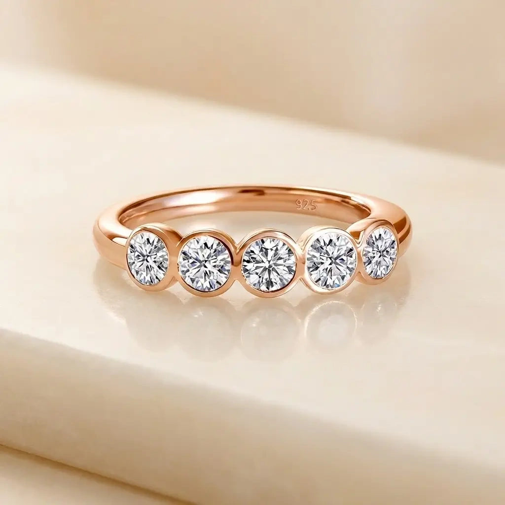 Five stone bezel moissanite ring in 925 sterling silver white gold, angled view with S925 stamp - Sensitive Stones