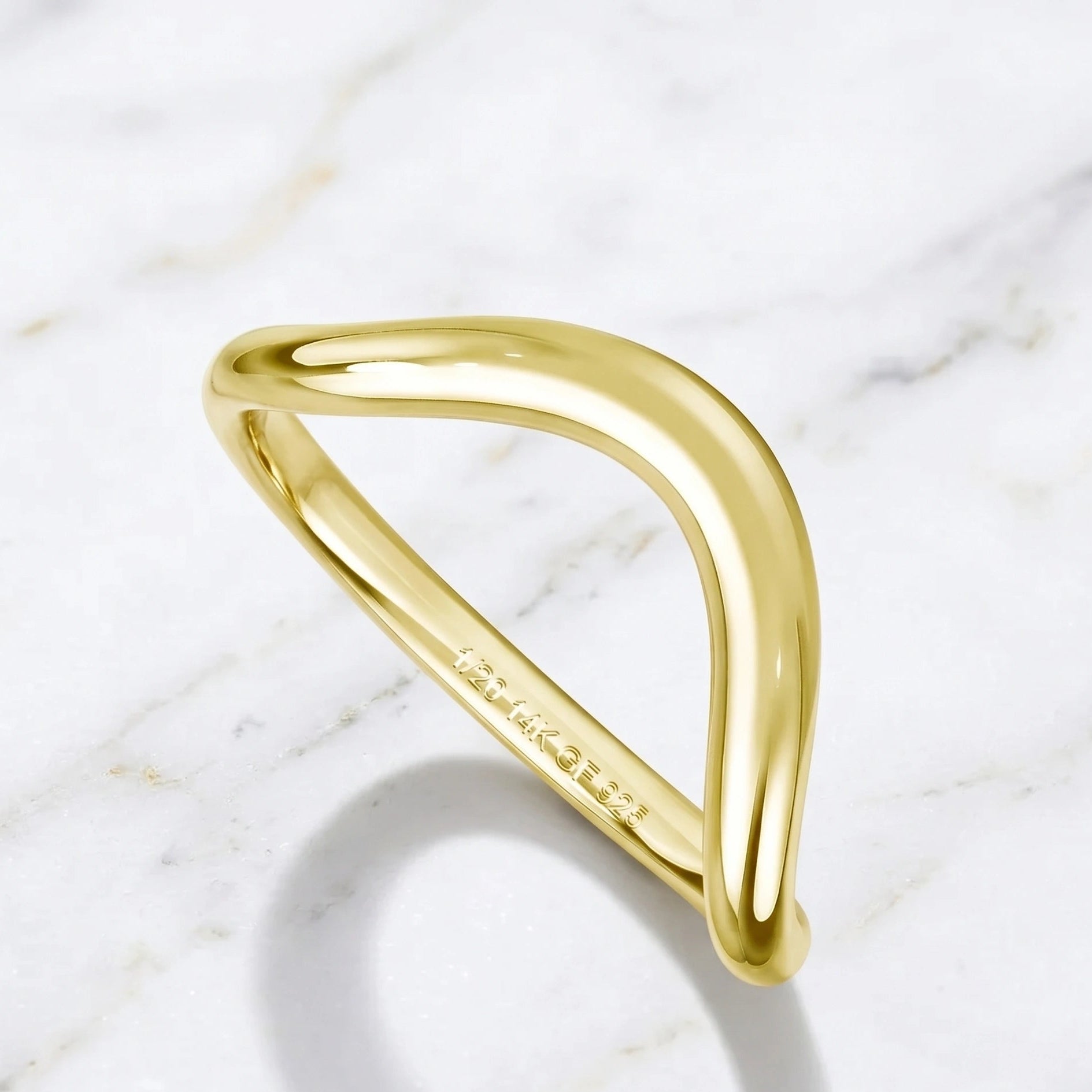 Gold filled wave stacking ring on marble surface showing 1/20 14K GF 925 interior hallmark - Sensitive Stones