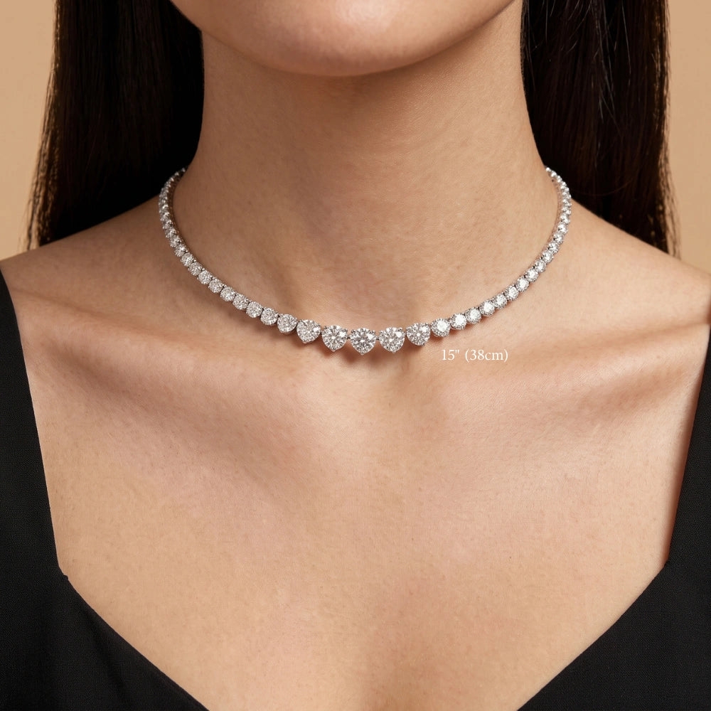 Graduated moissanite tennis necklace worn at 15in (38cm), sitting high on the neck as a choker