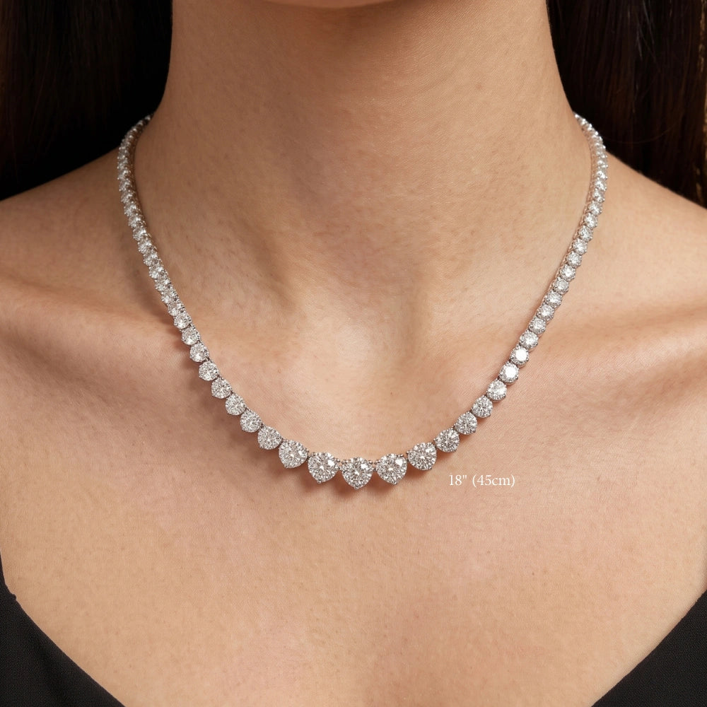 Graduated moissanite tennis necklace worn at 18in (45cm), falling just below the collarbone