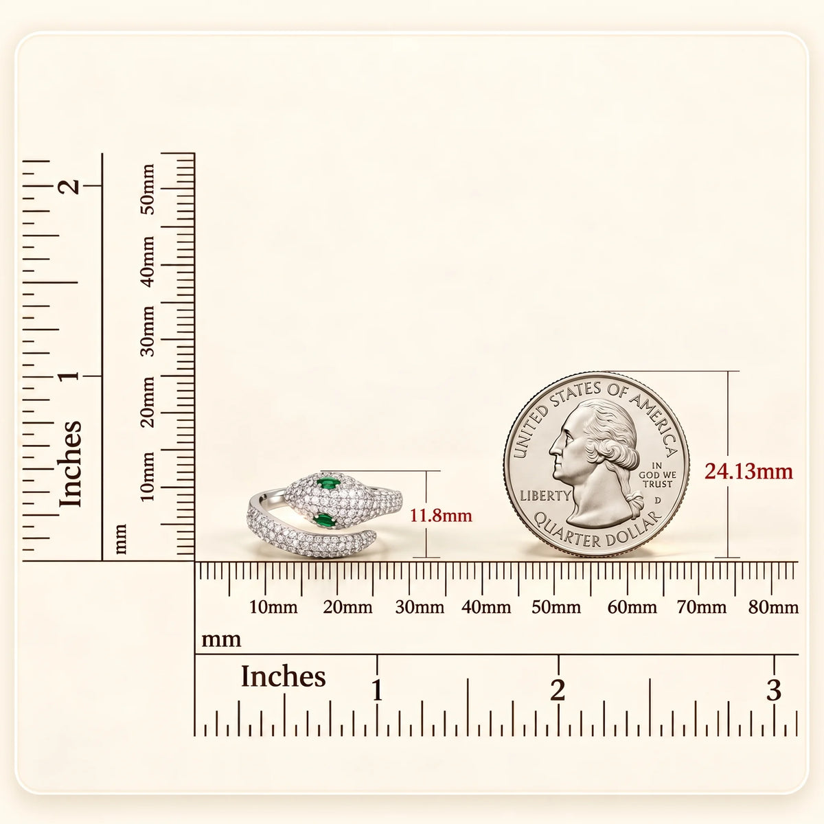 Size comparison of the green-eyed moissanite snake ring in a white gold finish beside a US quarter, with a ruler showing the 11.8mm head height - Sensitive Stones