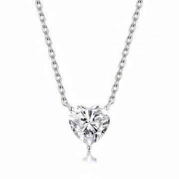Heart cut moissanite pendant necklace in 925 sterling silver with white gold finish on a cable chain against a plain background - Sensitive Stones